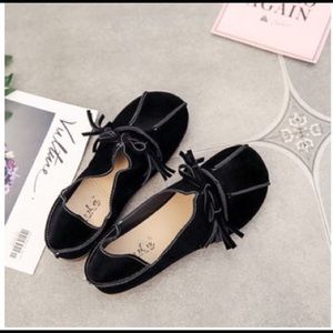 Women’s black suede loafers, size 6.5.